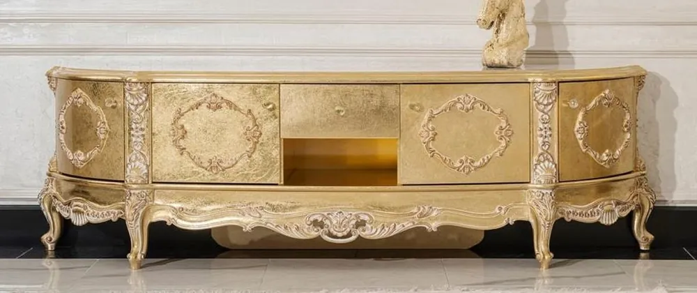 Casa Padrino Luxus Barock TV Schrank Gold - Prunkvolles Massivholz Sideboard mit 4 Türen und Schublade - Wohnzimmer Möbel im Barockstil - Barock Möbel - Edel & Prunkvoll Top-Seller