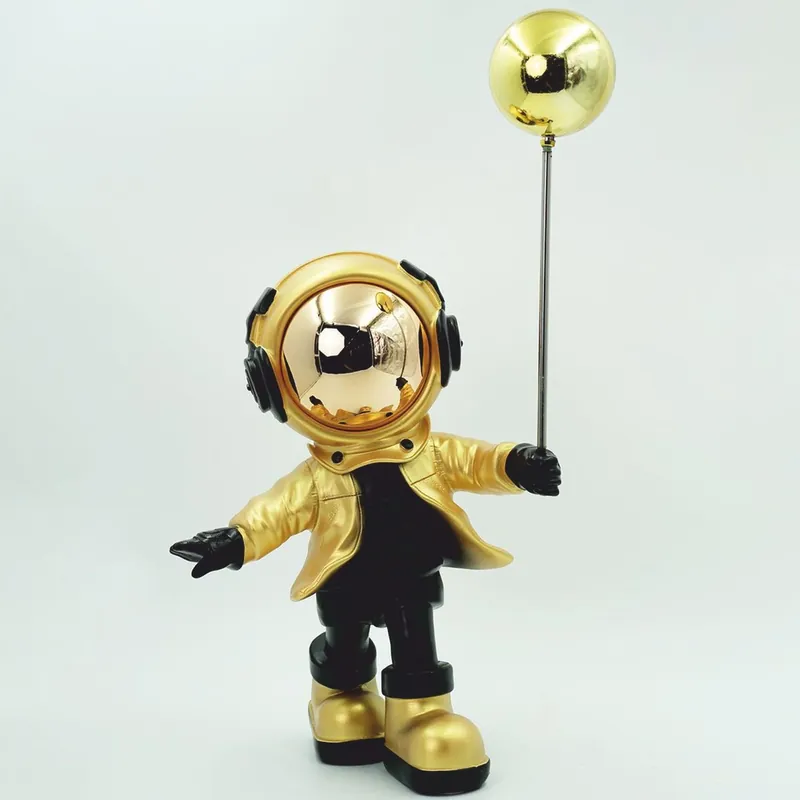 Casa Padrino figura decorativa astronauta con palloncino oro / nero A. 48 cm - Scultura decorativa Echt