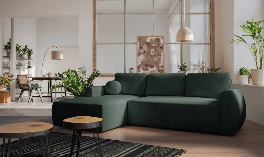 Ecksofa mit Schlaffunktion Colio grün linke Seite stilvolles Ecksofa mit interessanter Form Veloursstoff Zierkissen Ball Ausverkauf